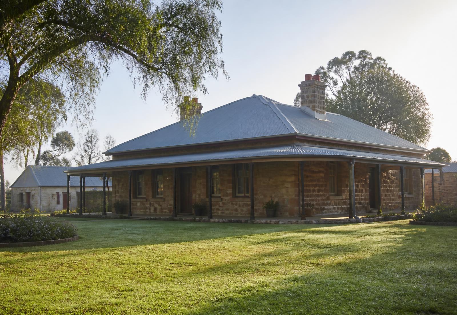 The restored ironstone homestead with its wide verandah